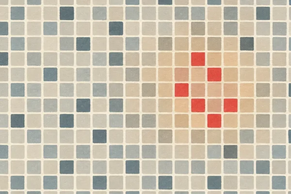 Abstract grid of muted squares with a small cluster of red squares clustered in the center, visualizing how YouTube's recommendation system selects winning videos